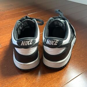 Nike panda dunks. Small damage seen in photo otherwise in good condition